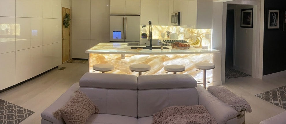 Acrylic light panels with illuminated wall art in a modern hallway